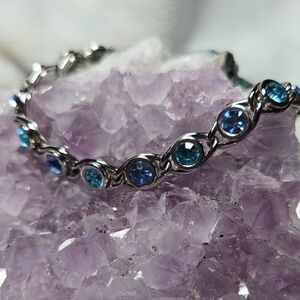 Silver and Blue Bracelet with Vintage-Inspired Design